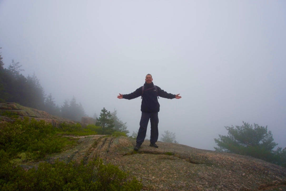 Waiting for the fog to roll in atop the summit