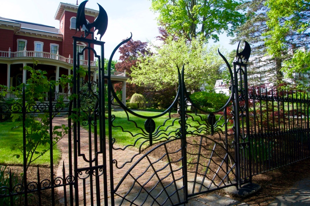 Cool gargoyle fence at Stephen King's home