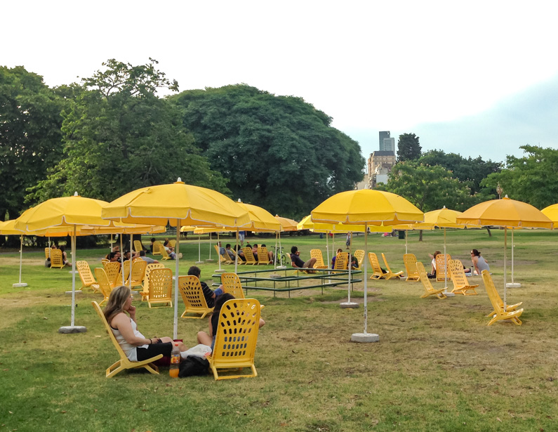 Beach chairs and umbrellas in the park near Museo Bellas Artes