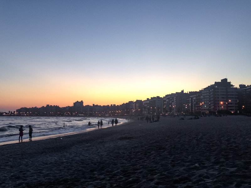 Walking along Pocitos Beach at sunset